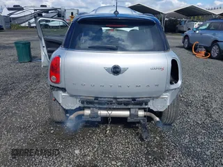 2014 MINI Countryman S z VIN WMWZC3C56EWP26003, wystawiony jako IAAI lot #41884630 z przebiegiem 101 683 mil mil oraz . Historia ofert i sprzedaży dostępna na DreamBid. Obrazek 6.