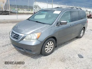 2010 Honda Odyssey EX-L with VIN 5FNRL3H68AB039883, listed as a IAAI auction lot 42000686 with 231,642 mi miles. Bid and sale history available at carsss.com. Image 2.
