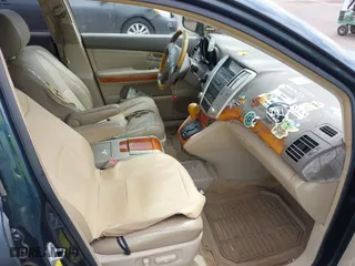 2005 Lexus RX 330 with VIN JTJGA31U050056409, listed as a IAAI auction lot 41828865 with 216,093 mi miles. Bid and sale history available at carsss.com. Image 5.