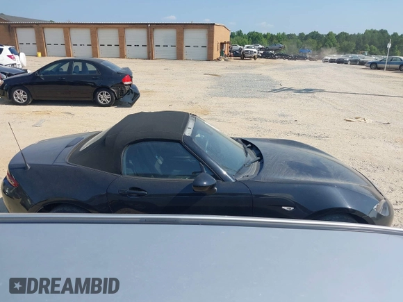 2021 Mazda MX-5 Miata Sport with VIN JM1NDAB73M0454064, listed as a IAAI auction lot 42613537 with 24,630 mi miles and . Bid and sale history available at DreamBid. Image 13.