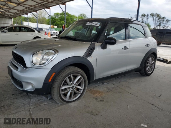 2014 MINI Countryman S with VIN WMWZC3C56EWP29211, listed as a Copart auction lot 52521145 with 91,396 mi miles and Salvage title. Bid and sale history available at DreamBid. Image 1.