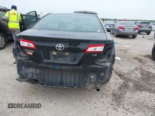 2014 Toyota Camry L with VIN 4T4BF1FK2ER390414, listed as a IAAI auction lot 41936368 with 164,811 mi miles and . Bid and sale history available at DreamBid. Image 6.