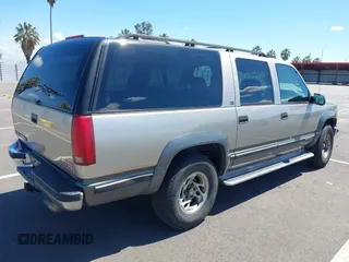 1999 GMC Suburban with VIN 3GKFK16R0XG511301, listed as a IAAI auction lot 41946753 with 231,650 mi miles and . Bid and sale history available at DreamBid. Image 4.