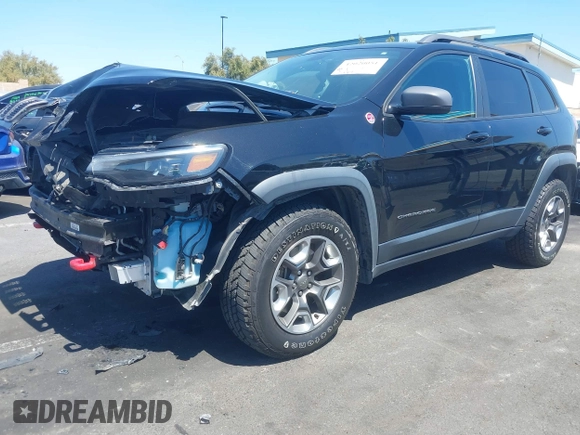 2019 Jeep Cherokee Trailhawk with VIN 1C4PJMBXXKD433284, listed as a IAAI auction lot 42020051 with 57,089 mi miles and . Bid and sale history available at DreamBid. Image 18.