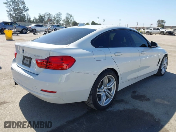 2015 BMW 4 Series 428i with VIN WBA4A9C50FGL85857, listed as a IAAI auction lot 42542619 with 136,411 mi miles and . Bid and sale history available at DreamBid. Image 4.