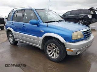 2004 Suzuki Grand Vitara z VIN JS3TE62V544100539, wystawiony jako IAAI lot #41900314 z przebiegiem 192 776 mil mil oraz . Historia ofert i sprzedaży dostępna na DreamBid. Obrazek 1.
