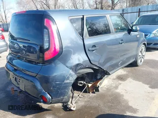 2014 Kia Soul + with VIN KNDJX3A52E7030918, listed as a IAAI auction lot 41857501 with 99,623 mi miles and . Bid and sale history available at DreamBid. Image 4.