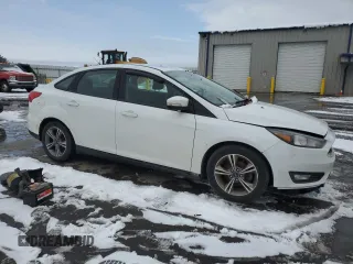 2018 Ford Focus SE with VIN 1FADP3F2XJL219528, listed as a Copart auction lot 46587325 with 143,896 mi miles and Salvage Title. Bid and sale history available at carsss.com. Image 4.
