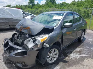 2016 Nissan Versa S z VIN 3N1CN7AP4GL831763, wystawiony jako IAAI lot #42243154 z przebiegiem 89 322 mil mil oraz . Historia ofert i sprzedaży dostępna na DreamBid. Obrazek 2.