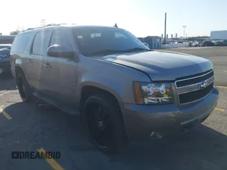 2009 Chevrolet Suburban LT w/2LT with VIN 1GNFC26069R190780, listed as a IAAI auction lot 41966765 with 206,413 mi miles. Bid and sale history available at carsss.com. Image 1.
