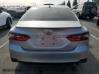2024 Toyota Camry LE with VIN 4T1C11AK7RU898436, listed as a Copart auction lot 86216844 with 5,201 mi miles and Salvage Title. Bid and sale history available at carsss.com. Image 6.