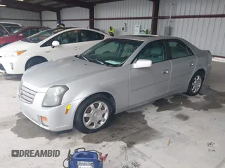 2003 Cadillac CTS z VIN 1G6DM57N930145288, wystawiony jako IAAI lot #42256164 z przebiegiem 184 428 mil mil oraz . Historia ofert i sprzedaży dostępna na DreamBid. Obrazek 2.