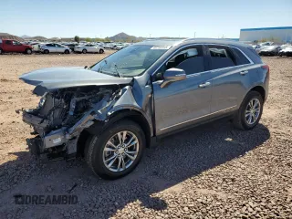 2021 Cadillac XT5 FWD Premium Luxury with VIN 1GYKNCRS9MZ186536, listed as a Copart auction lot 49745915 with 28,321 mi miles and Salvage Title. Bid and sale history available at carsss.com. Image 1.