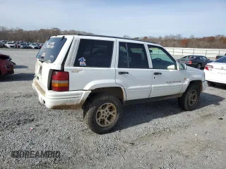 1996 Jeep Grand Cherokee Limited with VIN 1J4GZ78S2TY123592, listed as a Copart auction lot 84387624 with Not Provided miles and Salvage Title. Bid and sale history available at carsss.com. Image 3.