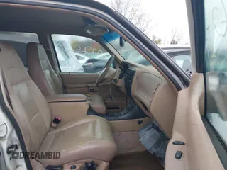 2000 Ford Explorer Eddie Bauer with VIN 1FMZU74EXYZA59442, listed as a IAAI auction lot 40810248 with 212,508 mi miles and . Bid and sale history available at DreamBid. Image 5.