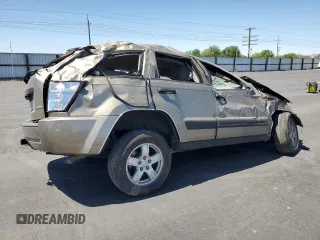 2005 Jeep Grand Cherokee Laredo z VIN 1J4HR48N65C517657, wystawiony jako Copart lot #58774685 z przebiegiem Nie podano mil oraz Szkoda całkowita • Salvage title. Historia ofert i sprzedaży dostępna na DreamBid. Obrazek 3.