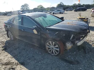 2015 Hyundai Azera Limited with VIN KMHFH4JG7FA480123, listed as a Copart auction lot 56900285 with 136,325 mi miles and Salvage title. Bid and sale history available at DreamBid. Image 4.