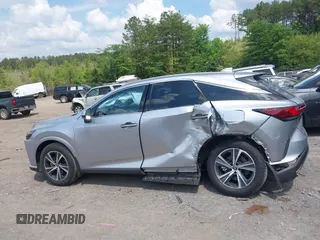 2024 Lexus RX 350 with VIN JTJCHMAAXR2020243, listed as a IAAI auction lot 42163373 with 6,970 mi miles and . Bid and sale history available at DreamBid. Image 14.