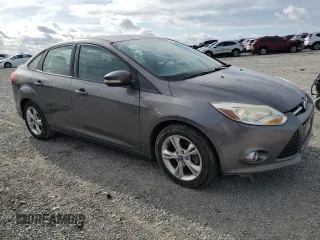 2012 Ford Focus SE with VIN 1FAHP3F27CL335046, listed as a Copart auction lot 55235175 with 128,119 mi miles and Salvage title. Bid and sale history available at DreamBid. Image 4.