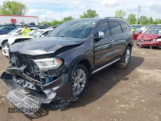 2014 Dodge Durango Citadel with VIN 1C4RDJEG7EC493379, listed as a IAAI auction lot 42159732 with 184,373 mi miles and . Bid and sale history available at DreamBid. Image 2.