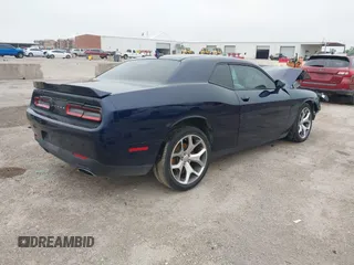 2016 Dodge Challenger SXT Plus z VIN 2C3CDZAG9GH354093, wystawiony jako IAAI lot #42107861 z przebiegiem 131 427 mil mil oraz . Historia ofert i sprzedaży dostępna na DreamBid. Obrazek 4.