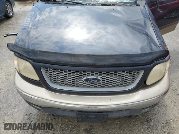 1999 Ford F-250 z VIN 1FTPX28L2XKA25212, wystawiony jako Copart lot #74911064 z przebiegiem Nie podano mil oraz Szkoda całkowita • Salvage title. Historia ofert i sprzedaży dostępna na DreamBid. Obrazek 11.