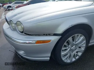 2003 Jaguar X-Type 2.5L Manual with VIN SAJEA51D33XC93300, listed as a IAAI auction lot 42048118 with 116,939 mi miles and . Bid and sale history available at DreamBid. Image 6.
