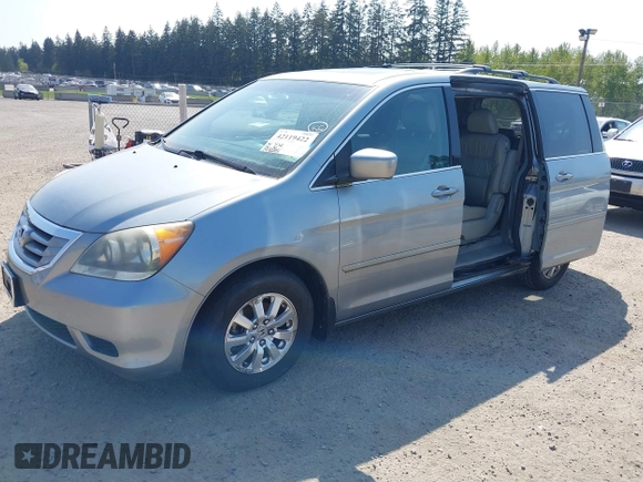 2009 Honda Odyssey EX-L with VIN 5FNRL38779B013943, listed as a IAAI auction lot 42119422 with 147,285 mi miles. Bid and sale history available at carsss.com. Image 2.