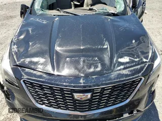 2021 Cadillac XT4 FWD Premium Luxury с VIN 1GYFZCR4XMF004996, выставлен на аукционе Copart как лот 61270355 с пробегом Не указан миль и Списание • Salvage title. История ставок и продаж доступна на DreamBid. Изображение 12.