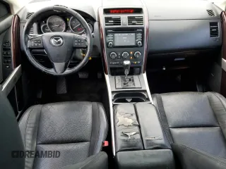 2015 Mazda CX-9 Grand Touring z VIN JM3TB2DA8F0457807, wystawiony jako Copart lot #61803555 z przebiegiem 110 104 mil mil oraz Czysty tytuł • Clean title. Historia ofert i sprzedaży dostępna na DreamBid. Obrazek 8.