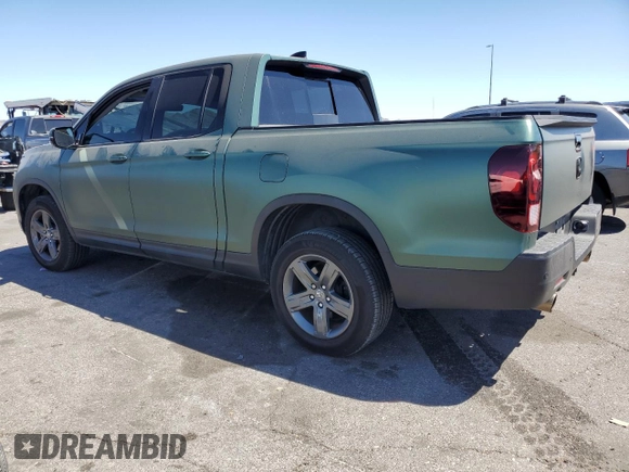 2022 Honda Ridgeline RTL-E with VIN 5FPYK3F73NB014672, listed as a Copart auction lot 54617475 with 76,160 mi miles and Salvage title. Bid and sale history available at DreamBid. Image 2.