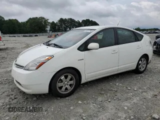 2006 Toyota Prius z VIN JTDKB20U867527026, wystawiony jako Copart lot #59057765 z przebiegiem 248 523 mil mil oraz Nie do naprawy • Non repairable. Historia ofert i sprzedaży dostępna na DreamBid. Obrazek 1.