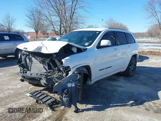 2021 Jeep Grand Cherokee Laredo X with VIN 1C4RJEAG0MC624799, listed as a IAAI auction lot 41409742 with 39,727 mi miles and . Bid and sale history available at DreamBid. Image 6.