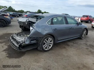 2016 Volkswagen Passat 1.8T SEL with VIN 1VWCT7A32GC065928, listed as a Copart auction lot 69158054 with 133,715 mi miles and Salvage Title. Bid and sale history available at carsss.com. Image 3.