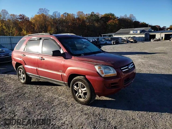 2005 Kia Sportage LX with VIN KNDJE723X57054667, listed as a Copart auction lot 77134794 with 159,748 mi miles and Salvage Title. Bid and sale history available at carsss.com. Image 12.