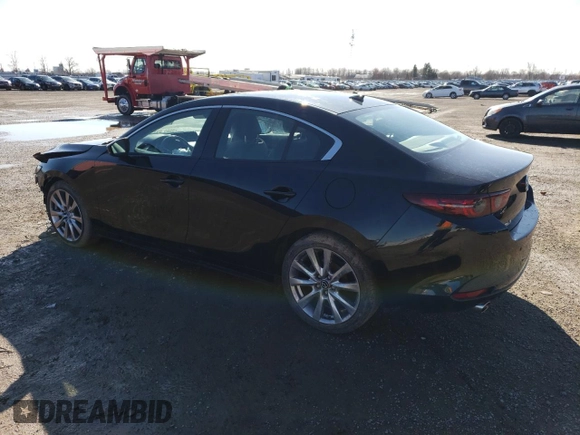 2021 Mazda 3 Premium with VIN 3MZBPADL1MM203008, listed as a Copart auction lot 48887465 with 66,192 mi miles and Salvage title. Bid and sale history available at DreamBid. Image 2.