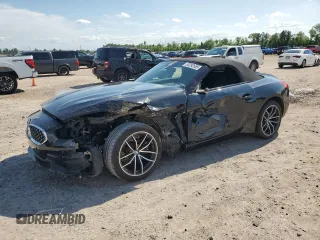 2022 BMW Z4 sDrive30i with VIN WBAHF3C05NWX43513, listed as a Copart auction lot 53292655 with 9,657 mi miles and Salvage Title. Bid and sale history available at carsss.com. Image 1.