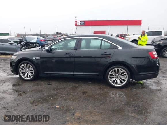 2015 Ford Taurus Limited with VIN 1FAHP2F87FG146554, listed as a IAAI auction lot 41712502 with 103,117 mi miles. Bid and sale history available at carsss.com. Image 14.
