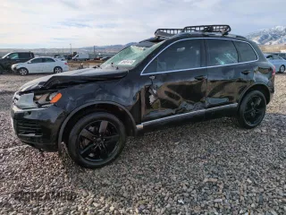2013 Volkswagen Touareg Sport z VIN WVGEP9BPXDD006916, wystawiony jako Copart lot #80487474 z przebiegiem 147 051 mil mil oraz Szkoda całkowita • Salvage title. Historia ofert i sprzedaży dostępna na DreamBid. Obrazek 1.