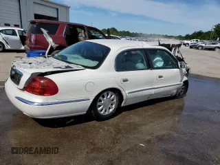 1999 Lincoln Continental with VIN 1LNHM97VXXY680512, listed as a Copart auction lot 58444304 with Not Provided miles and Non Repairable. Bid and sale history available at DreamBid. Image 3.