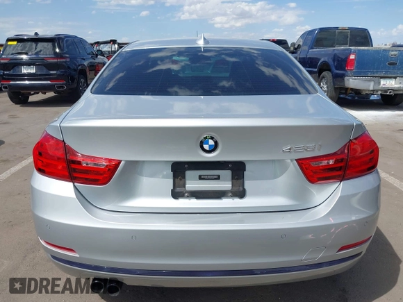 2015 BMW 4 Series 428i with VIN WBA3N7C54FK225045, listed as a IAAI auction lot 42042980 with 72,909 mi miles. Bid and sale history available at carsss.com. Image 16.