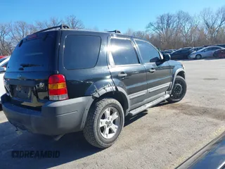 2007 Ford Escape XLT with VIN 1FMYU03137KA69934, listed as a IAAI auction lot 41007739 with 193,956 mi miles and . Bid and sale history available at DreamBid. Image 4.
