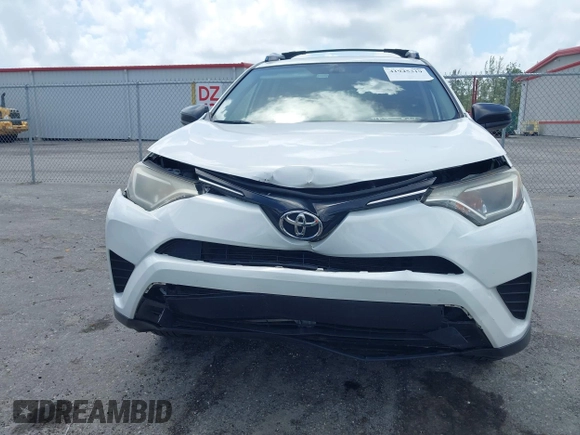 2016 Toyota RAV4 LE with VIN JTMZFREV2GJ096782, listed as a IAAI auction lot 41945319 with 76,866 mi miles. Bid and sale history available at carsss.com. Image 13.