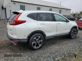 2019 Honda CR-V Touring with VIN 2HKRW2H91KH633732, listed as a Copart auction lot 52750975 with 58,642 mi miles and Salvage Title. Bid and sale history available at carsss.com. Image 3.