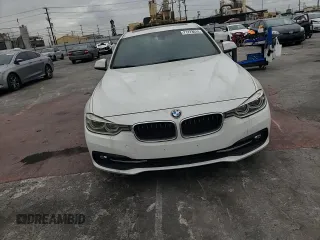 2018 BMW 3 Series 330i with VIN WBA8B9G57JNU57523, listed as a Copart auction lot 71773014 with 66,035 mi miles and Salvage Title. Bid and sale history available at carsss.com. Image 10.