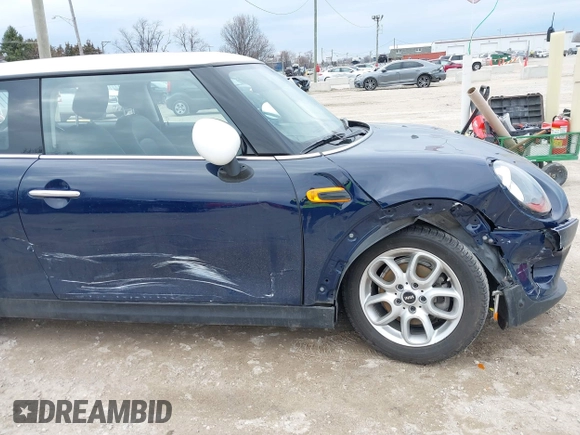 2017 MINI Hardtop Cooper with VIN WMWXP5C34H3B15966, listed as a IAAI auction lot 41889565 with 21,579 mi miles and . Bid and sale history available at DreamBid. Image 6.