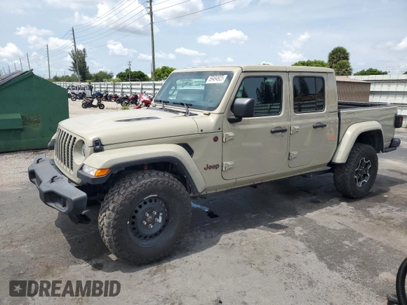 2022 Jeep Gladiator Rubicon с VIN 1C6JJTBG2NL171598, выставлен на аукционе Copart как лот 59494925 с пробегом 46 097 миль миль и Списание • Salvage title. История ставок и продаж доступна на DreamBid. Изображение 1.
