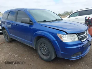 2015 Dodge Journey SE z VIN 3C4PDCAB8FT552555, wystawiony jako IAAI lot #42195398 z przebiegiem 149 503 mil mil oraz . Historia ofert i sprzedaży dostępna na DreamBid. Obrazek 1.