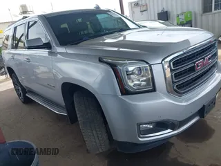 2015 GMC Yukon SLE z VIN 1GKS2AKC2FR677320, wystawiony jako IAAI lot #42312696 z przebiegiem 161 640 mil mil oraz . Historia ofert i sprzedaży dostępna na DreamBid. Obrazek 1.