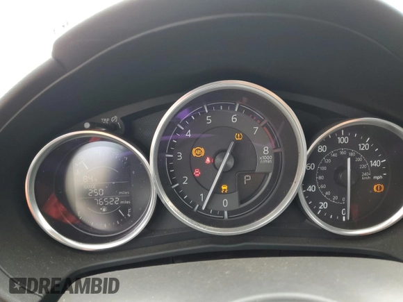 2016 Mazda MX-5 Miata Club z VIN JM1NDAC73G0103805, wystawiony jako Copart lot #51724195 z przebiegiem 76 522 mil mil oraz Szkoda całkowita • Salvage title. Historia ofert i sprzedaży dostępna na DreamBid. Obrazek 9.